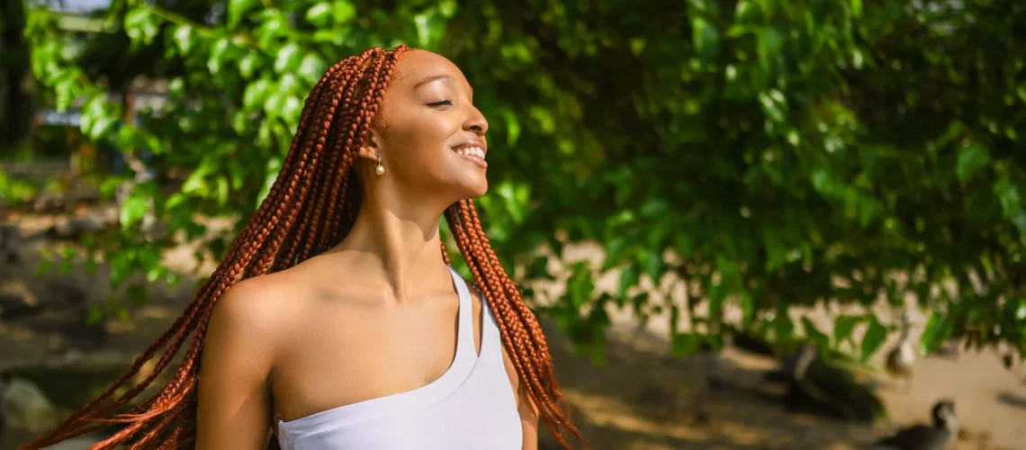 woman wearing boho knotless braids in San Antonio summer